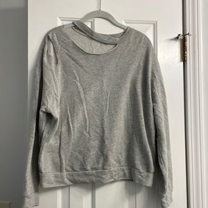 Size M- Gray sweatshirt w/rip detail